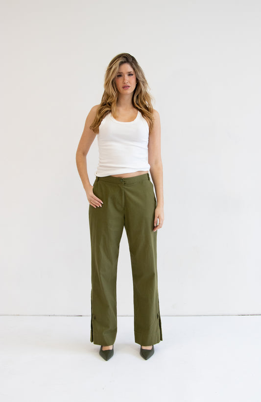 Front view of model wearing khaki heidi pant with white singlet