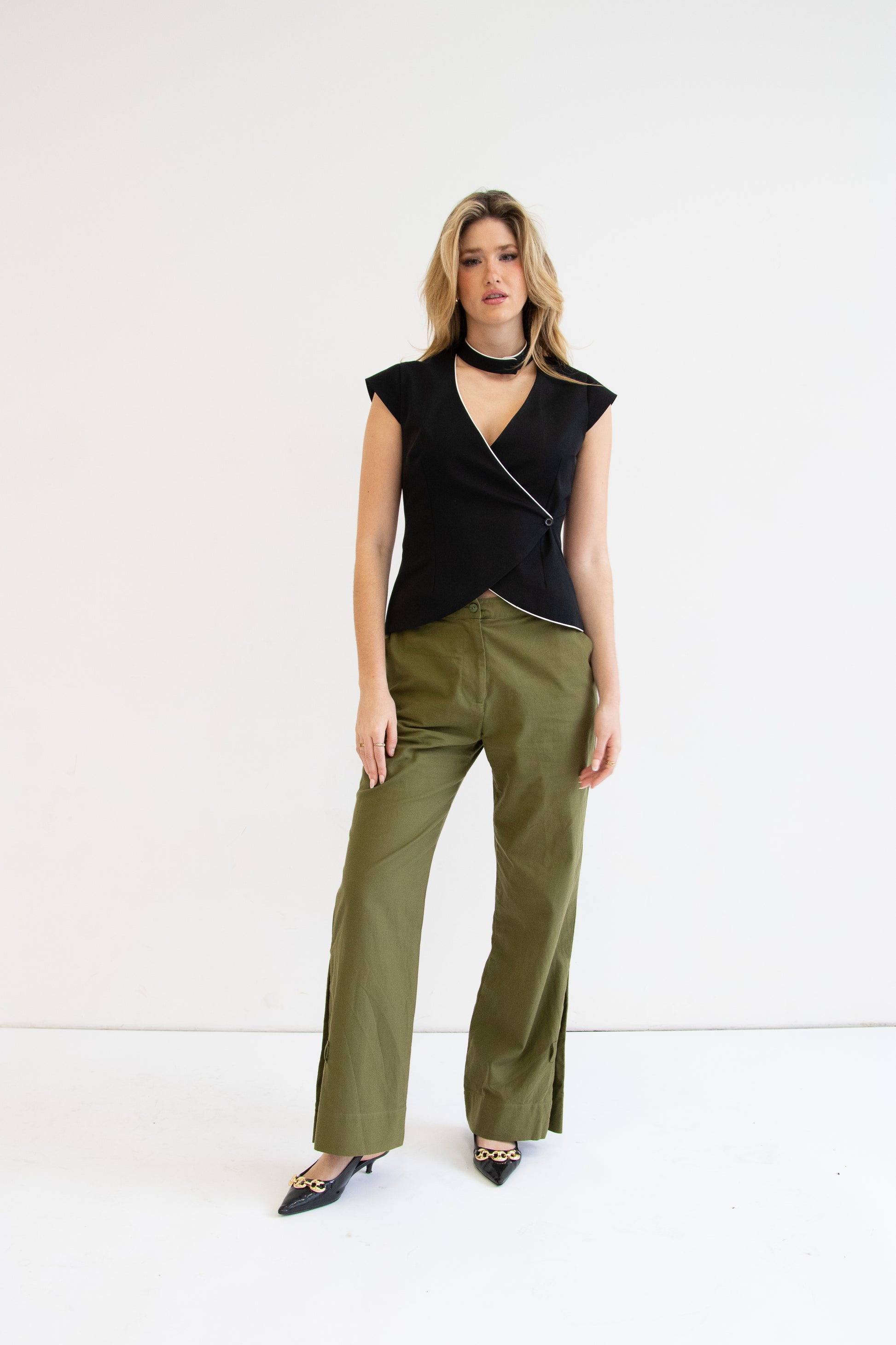 Front view of model wearing valerie vest with heidi pant and heels