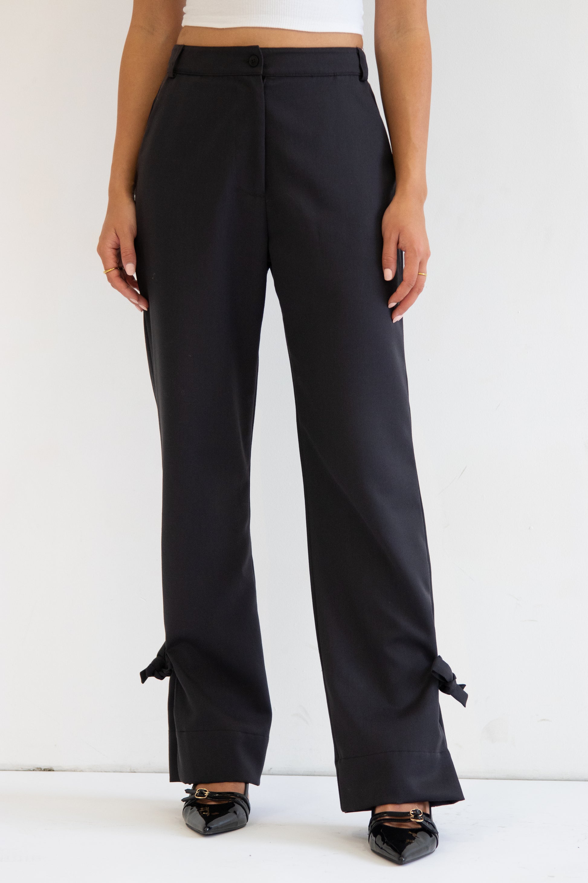 Close up front view of heidi pant with ties attached at hem