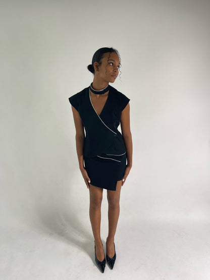 black tailored vest with v neckline and ivory sating piping